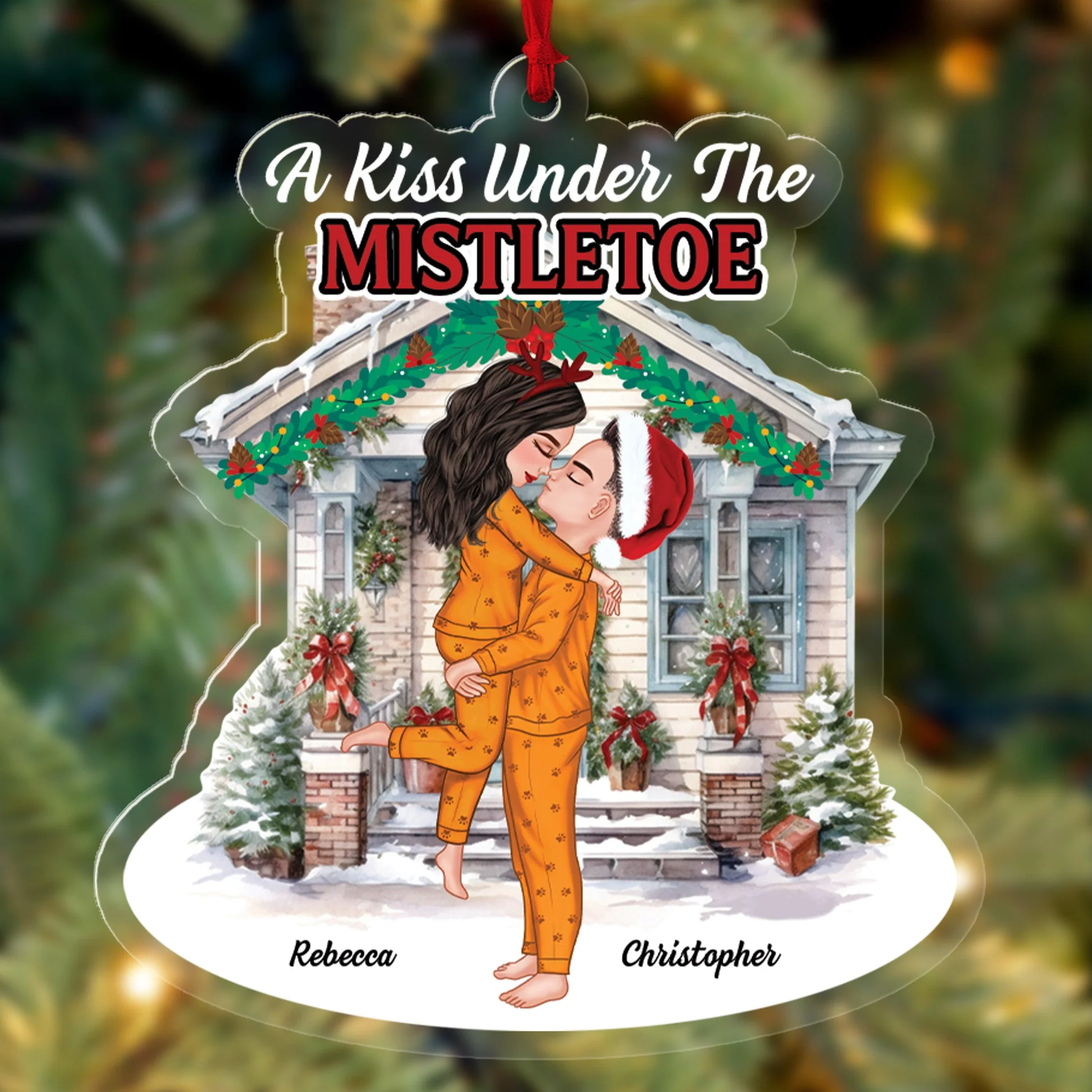 kiss under this christmas decoration crossword clue