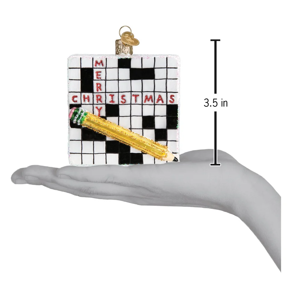 spherical christmas tree ornament crossword clue